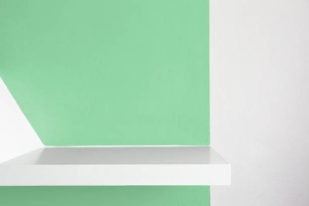 istock Empty white shelf, retail shelves from plywood frame. green color 1124339700