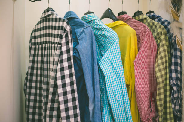 istock color linen shirts on hangers 1124340591