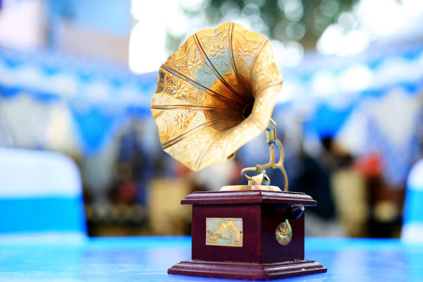 Vintage style gramophone, vinyl music player with blue background