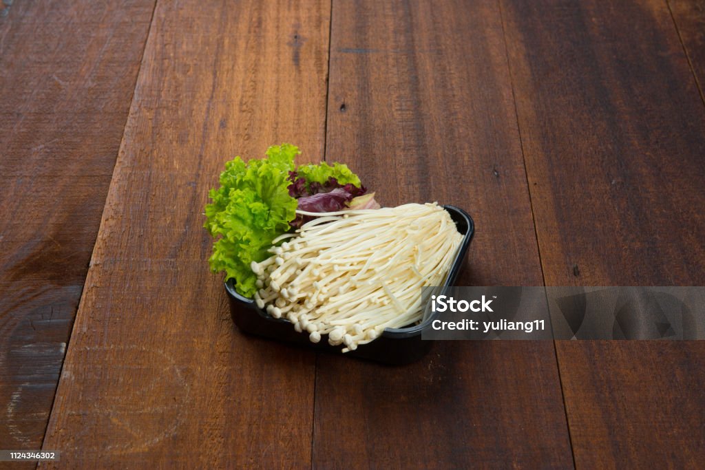 enoki mushroom on plate Bunch Stock Photo