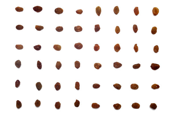 Raisins on a blue table.