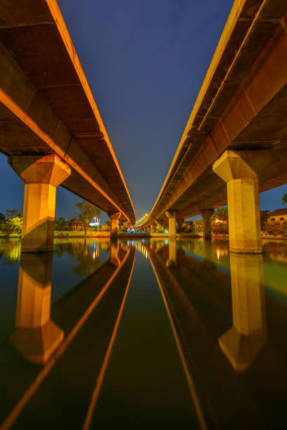 istock Elevated road network in Bangkok at night 1124351185