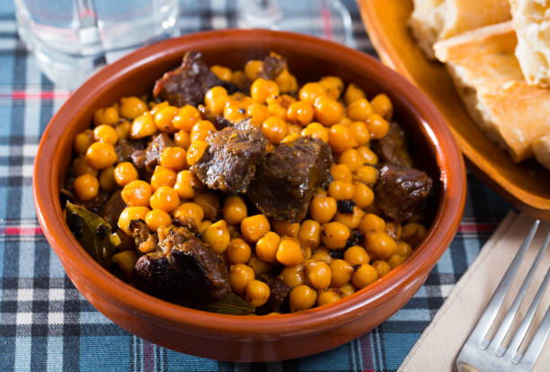 istock Beef stew with chickpeas in a clay plate 1124351598