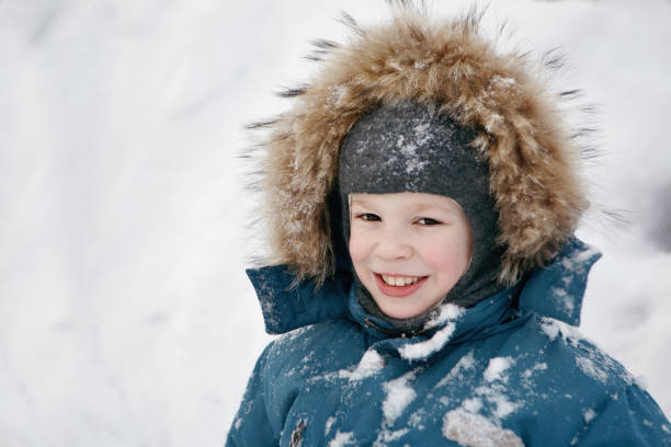 istock The boy is outdoors, winter day 1124353188