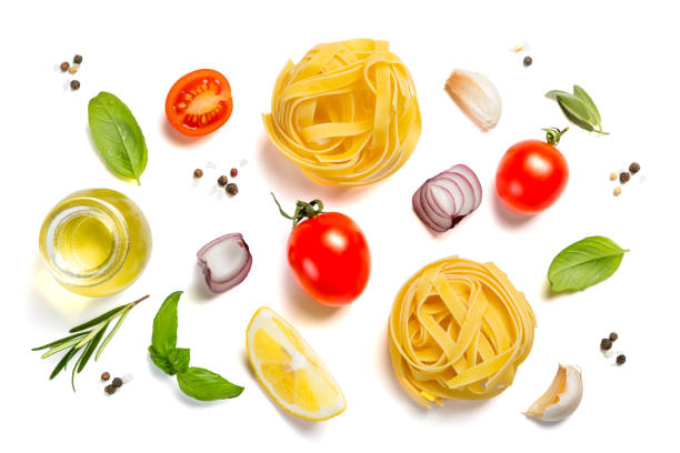istock Italian cuisine concept - raw pasta and ingredients 1124354587