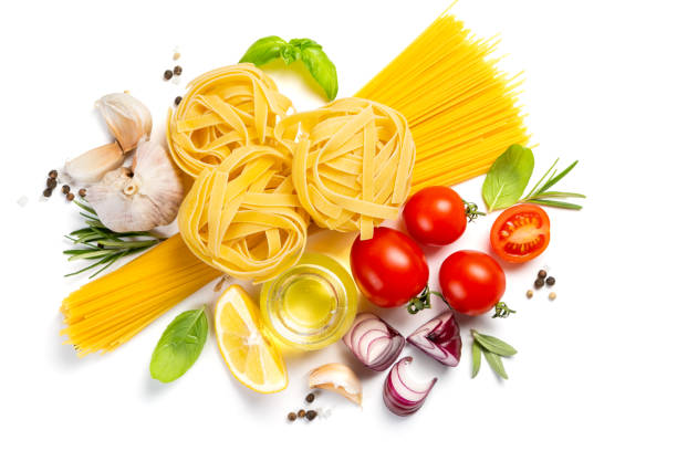 istock Italian cuisine concept - raw pasta and ingredients 1124354676
