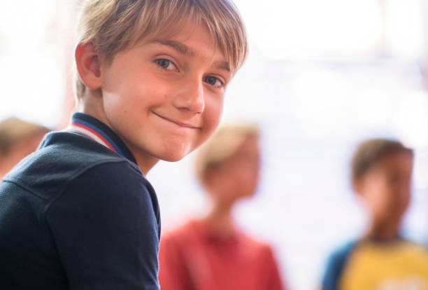 istock Close-up portrait of smiling elementary schoolboy 1124355057