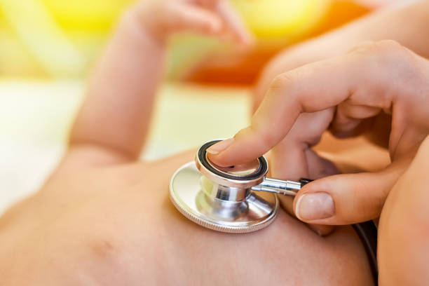 istock Small child being examined by a doctor 1124355185