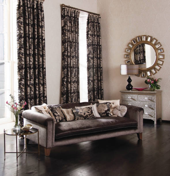 istock Comfortable sofa with cushions in living room 1124357731