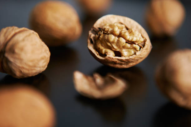 walnuts - healthy eating macro close up nut imagens e fotografias de stock