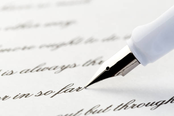 istock white fountain pen writing a letter 1124361071