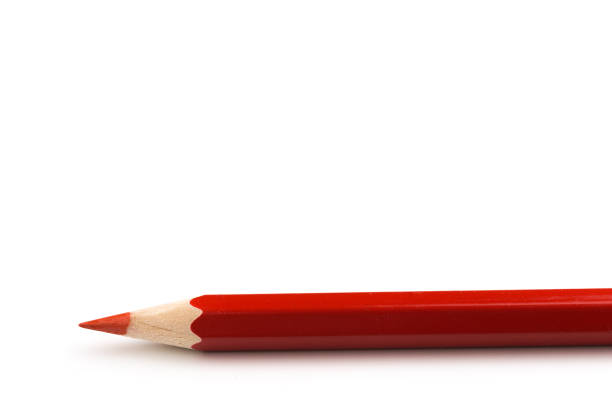 istock Wooden red pencil isolated on a white background, close ap 1124361862
