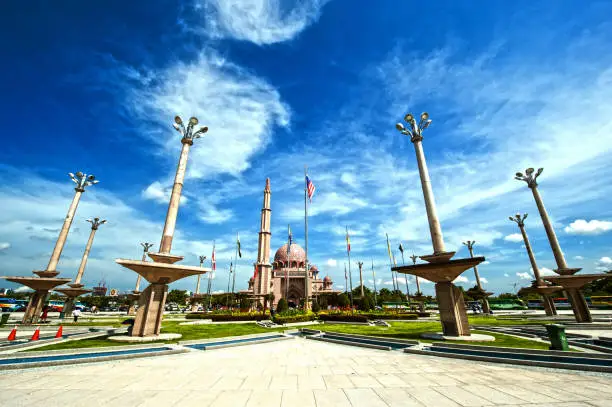 Dataran Putra or Putra Square is located opposite Perdana Putra. It is the venue of national-level celebrations and festivals including the Malaysian Independence Day parade. The square is actually two concentric plazas, divided into star-shaped segments that represent the states in Malaysia. An interplay of paths, water, channels, flower beds and trees makes the square a picturesque stop for visitors. Dataran Putra or Putra Square is located opposite Perdana Putra. It is the venue of national-level celebrations and festivals including the Malaysian Independence Day parade. The square is actually two concentric plazas, divided into star-shaped segments that represent the states in Malaysia. An interplay of paths, water, channels, flower beds and trees makes the square a picturesque stop for visitors.