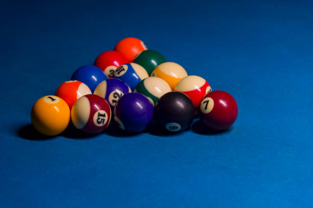 istock Billiard balls on pool blue table - sport background 1124366993