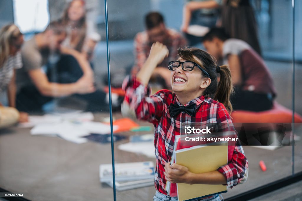 Happy Nerdy College Student Celebrating Success At Campus Stock Photo