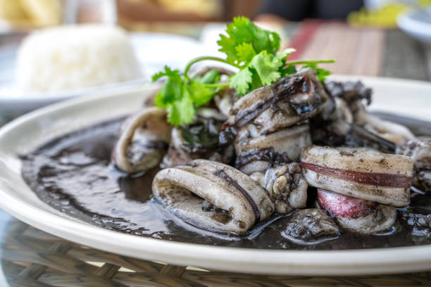 Squid black soup, local food in eastern Thailand stock photo