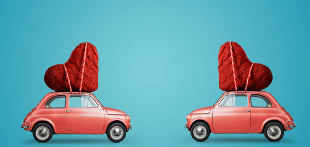 istock Toy car delivering heart 1124369251