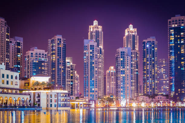 istock Illuminated Buildings Against Sky At Night 1124369536