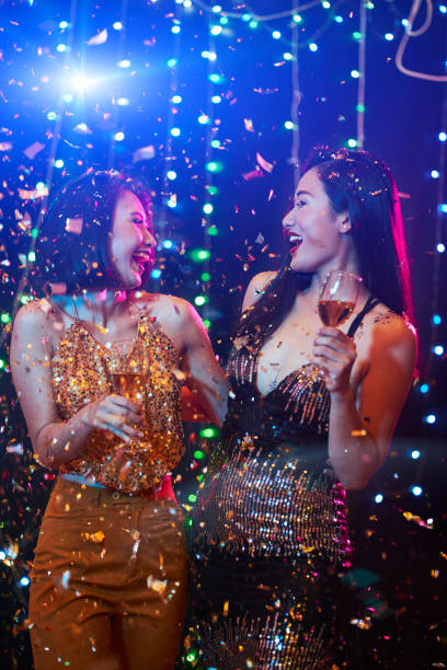 istock Female friends in night club 1124376352