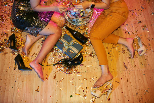 istock Barefeet women at party 1124376412