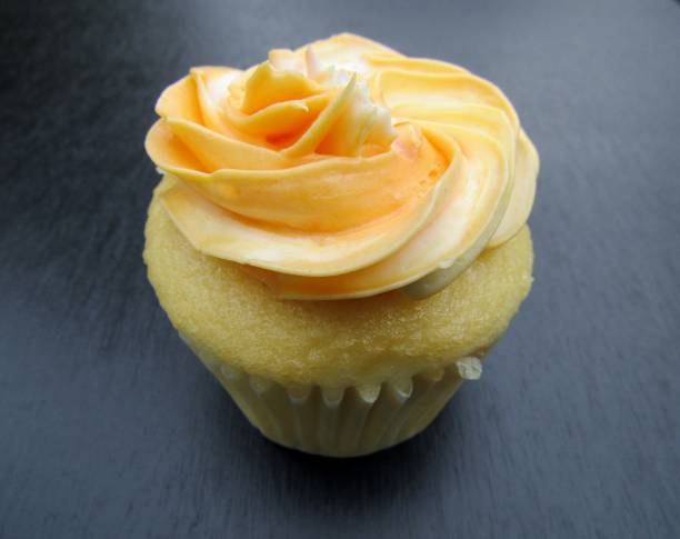 istock Lemon cupcake with yellow frosting 1124376534