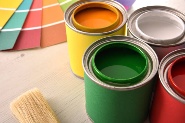 istock Colorful paint pots open and color palette elevated detail 1124381788