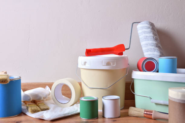 istock Paint pots for home composition on parquet general view 1124381829