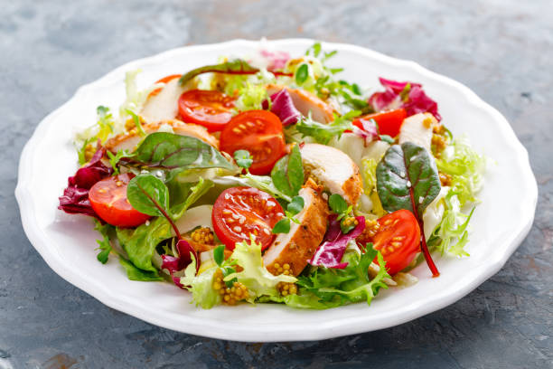 istock Fresh vegetable salad with grilled chicken meat 1124383553