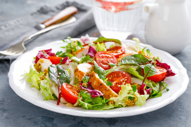 istock Fresh vegetable salad with grilled chicken meat 1124384244