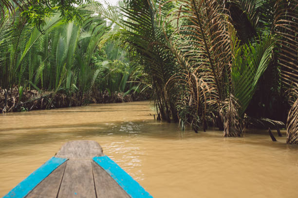 istock Wooden Rowboat In River At Forest 1124387378