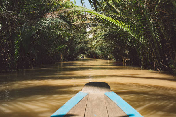 istock Wooden Rowboat In River At Forest 1124387384
