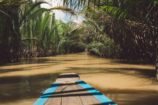 istock Wooden Rowboat In River At Forest 1124387393
