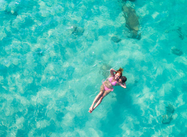 istock swimming you and me 1124387950