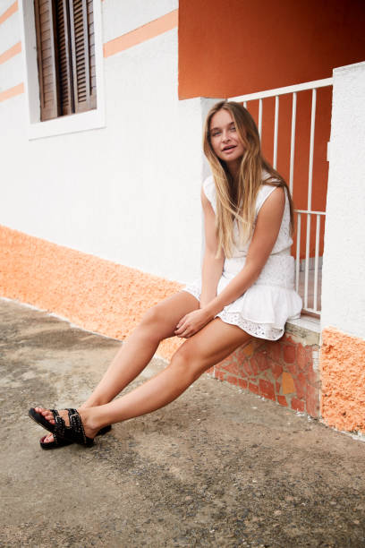 istock Young woman in white 1124392250