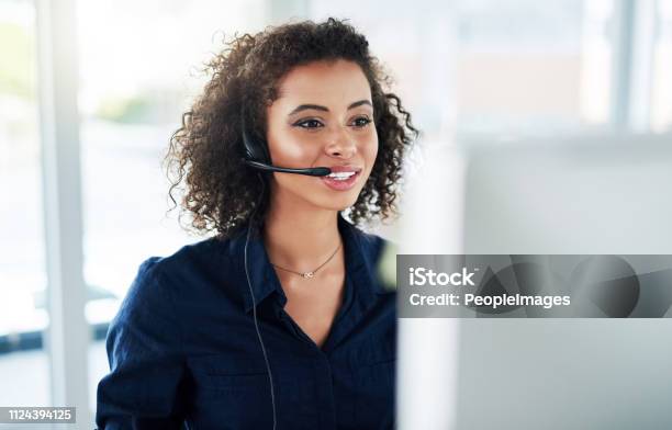 Shes Determined To Help As Many Customers As Possible Stock Photo - Download Image Now