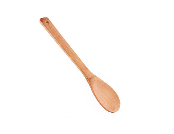 istock Wooden spoon and fork isolated on white background bamboo top view, angle 1124396062