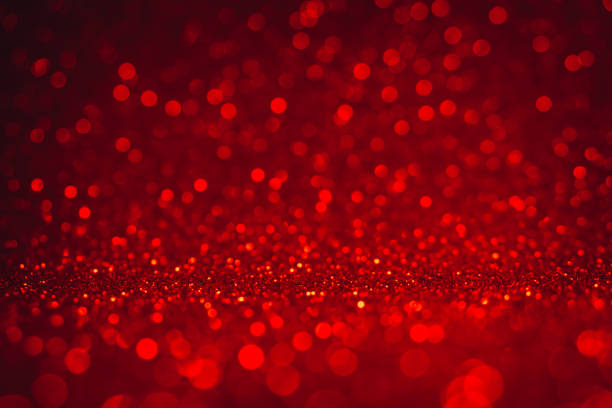 istock Red bokeh and red background. Valentine's day red lights defocused concept. 1124398217