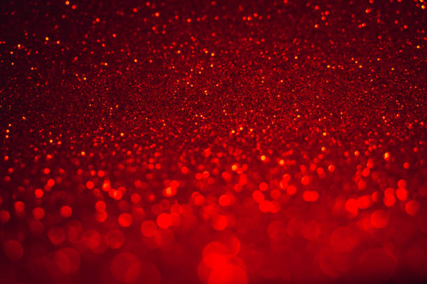 istock Red bokeh and red background. Valentine's day red lights defocused concept. 1124398933