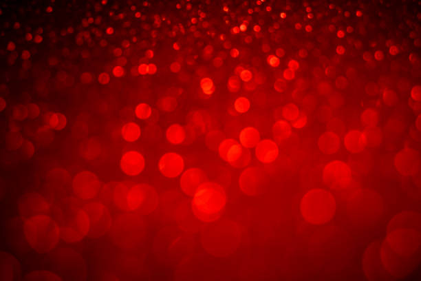 istock Red bokeh and red background. Valentine's day red lights defocused concept. 1124398944