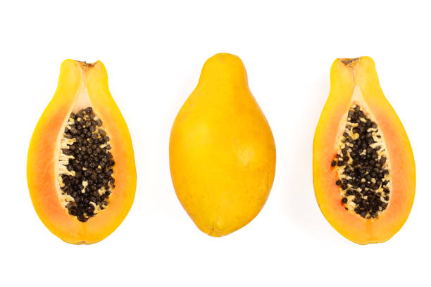 istock ripe papaya and half isolated on a white background. Top view. Flat lay 1124399217
