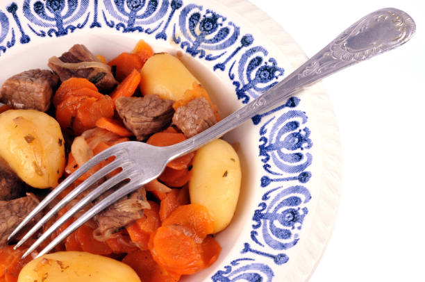 istock Plate of beef, carrots and potatoes 1124399469