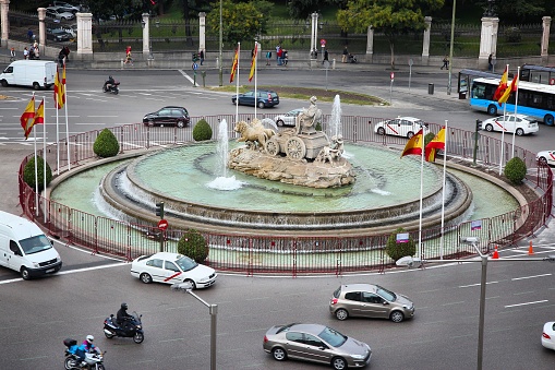Traffic at the Cibeles Square in Madrid, Spain. 3.2 million people live in Spanish capital city. It is the 3rd largest city in European Union.