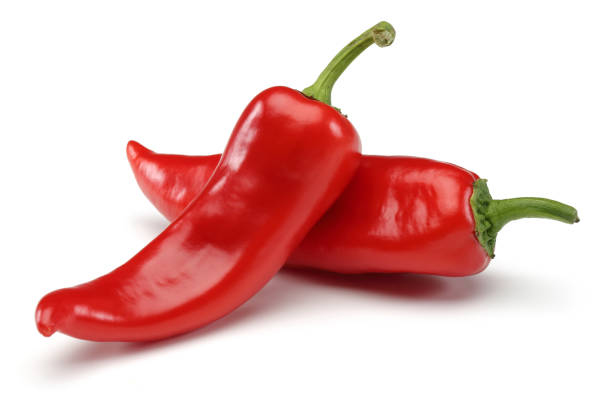 白地赤ピーマン - red chili pepper ストックフォトと画像