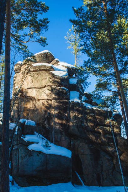 istock lonely rock in winter 1124403495