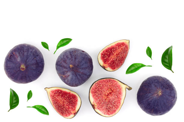 istock fig fruits with leaves isolated on white background with copy space for your text. Top view. Flat lay pattern 1124407900