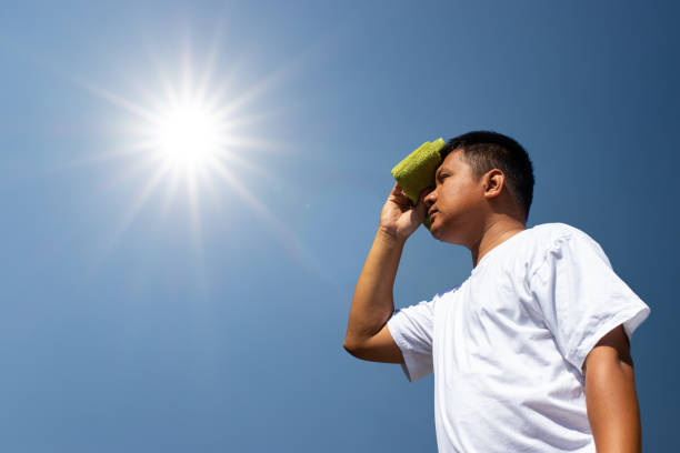 istock Young man and heat stroke. 1124408865