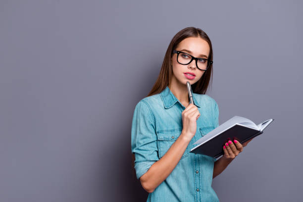 istock Close up portrait of attractive deeply thinking over at lesson b 1124413634