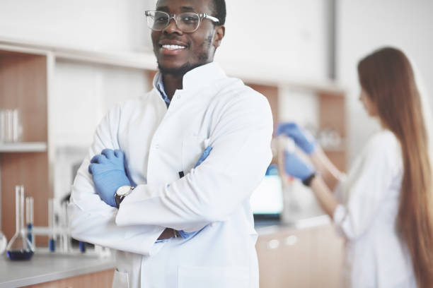 istock Laboratory laboratories conduct experiments in a chemical laboratory in transparent flasks. Output formulas 1124414218