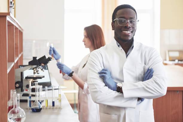 istock Laboratory laboratories conduct experiments in a chemical laboratory in transparent flasks. Output formulas 1124414432