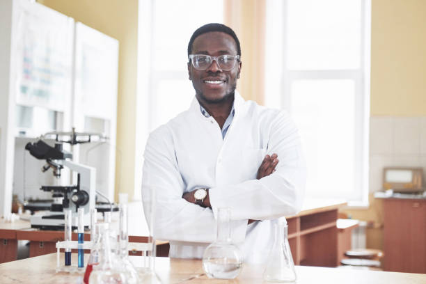 istock An African American worker works in a laboratory conducting experiments. 1124414798